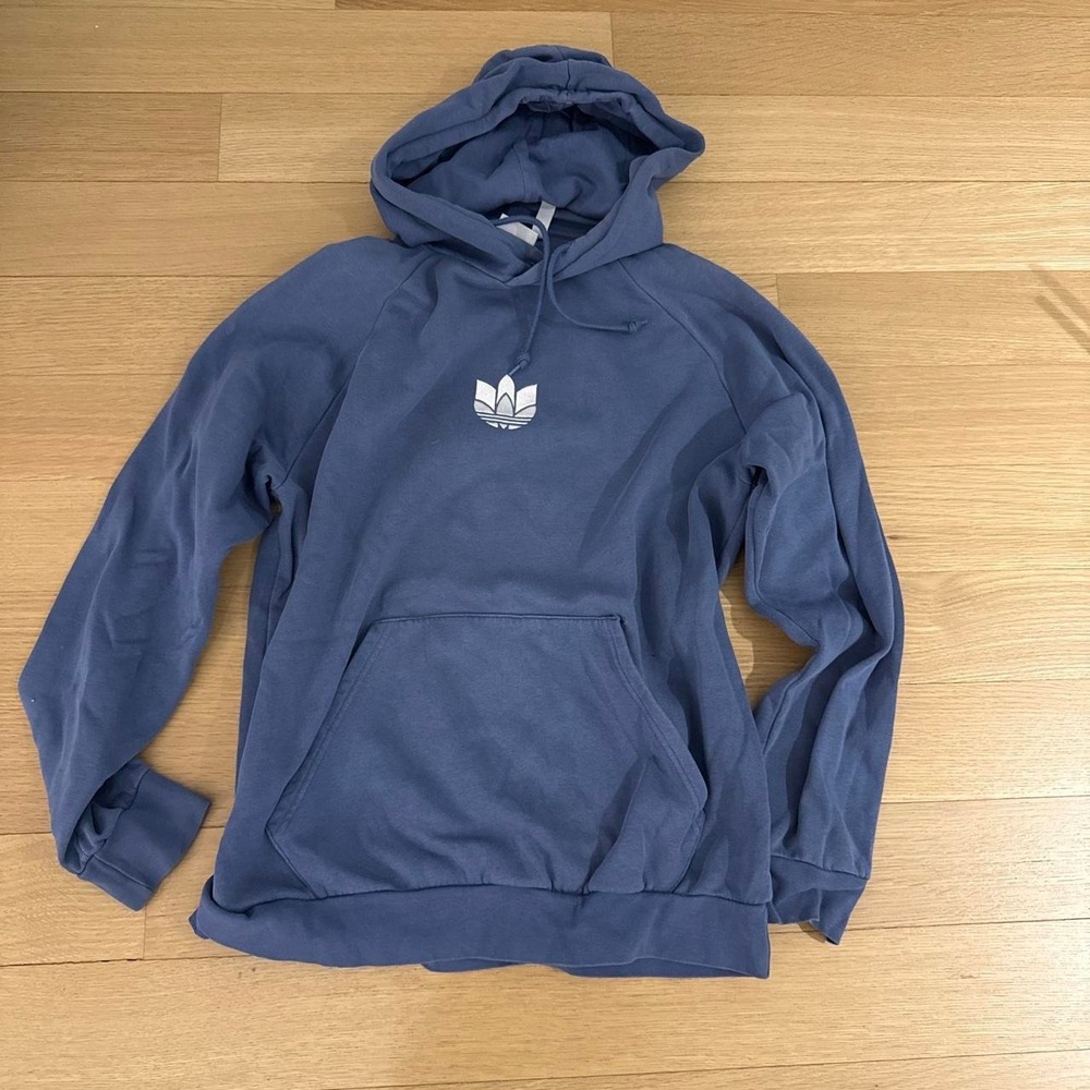 Blue Adidas hoodie with white trefoil logo